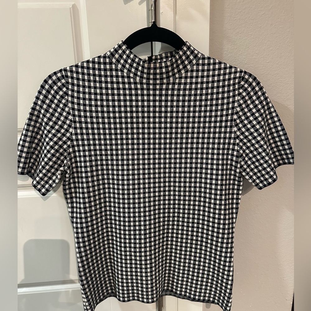 Akris size 4 black and white checkered shirt.